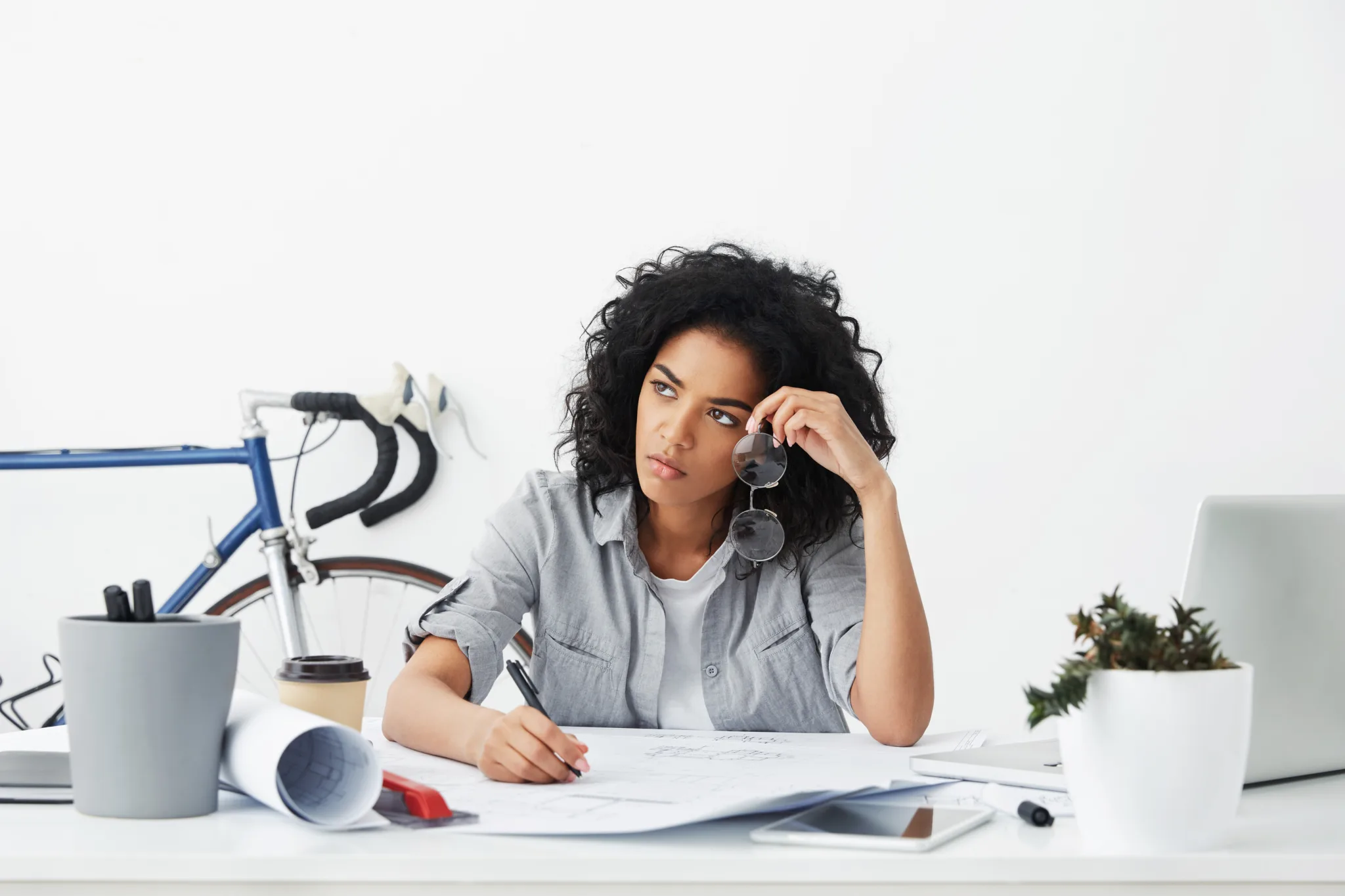 unhappy tired Black female architect at work; change in career, change in careers, changes in career, changed careers, reasons for a job change, reasons to change job, reasons for change job, reasons for changing the job, reasons for change of job, reasons for change in job, career change reason reasons for a career change reasons to change career reasons to change careers job switch reasons, reasons to change jobs, reasons for changing jobs,