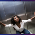 a woman squatting in an elevator; imposter syndrome trap and isolation in the workplace for Black women, Coaching for imposter syndrome