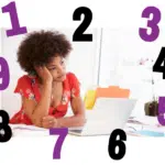 a woman sitting at a desk with a laptop; Is-Your-Boss-Sabotaging-Your-Success__Twanna-Carter
