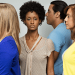 Lonely-woman-standing-in-a-crowd-isolation-Black-women; Career coaching for Black women in senior roles; Coaching services for Black women professionals