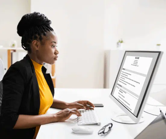 African American manager reading a resume; These 9 Transferable Skills Resources; Black executive coach Twanna Carter; find Black executive coach; transferrable skills; career pivot; career transition; best Black career coach near; how to pivot career; doubt about career change